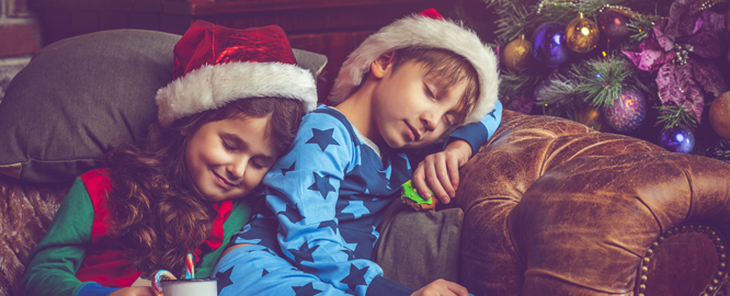 kids sleeping with santa hat