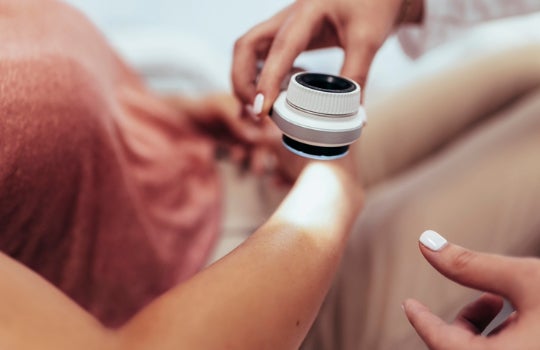 Dermatologist doing a skin check