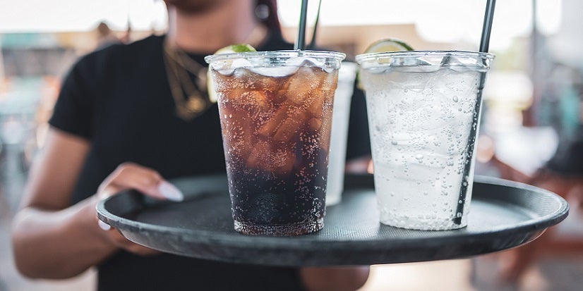 Soda and alcohol on tray