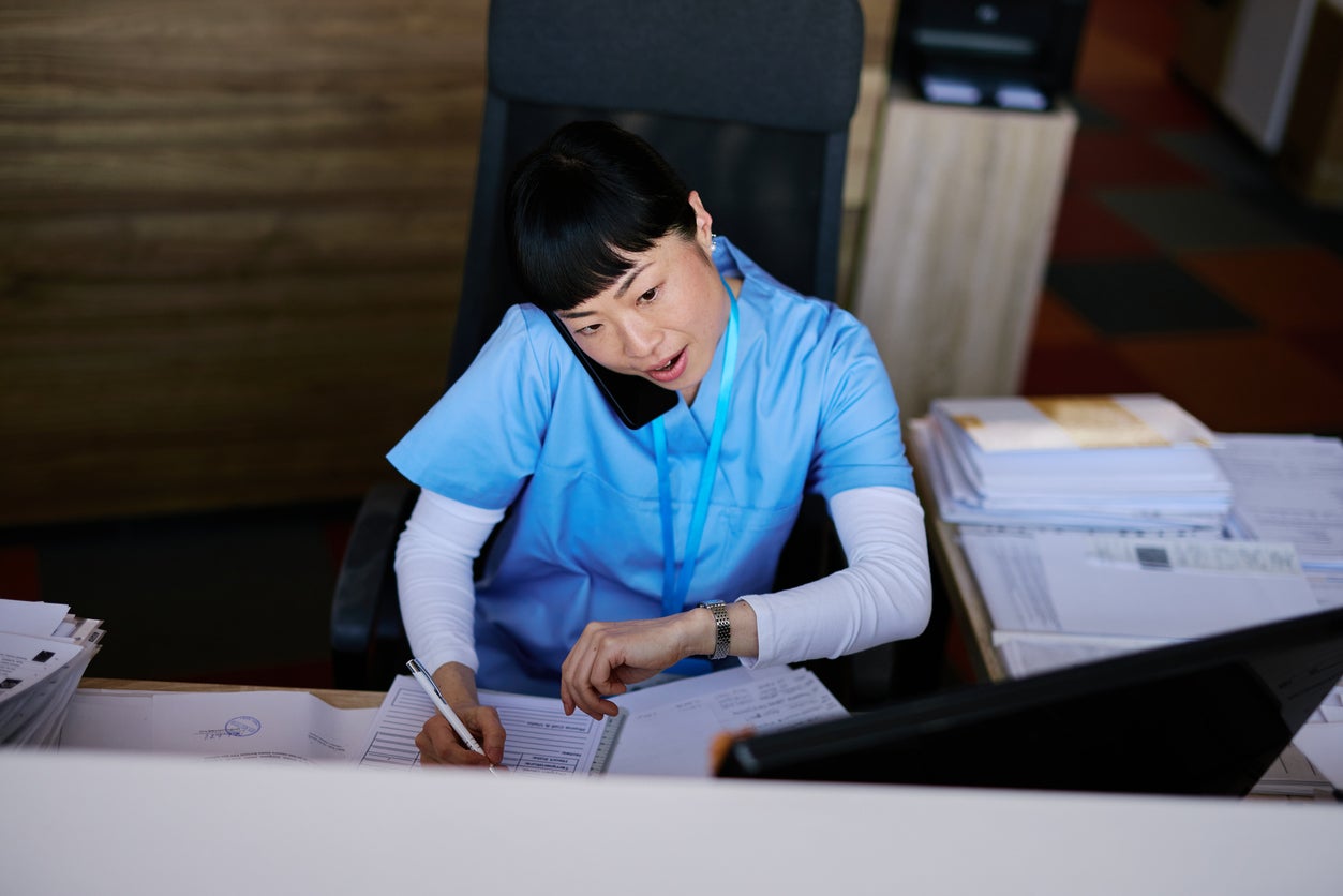 Nurse working at nurse's station