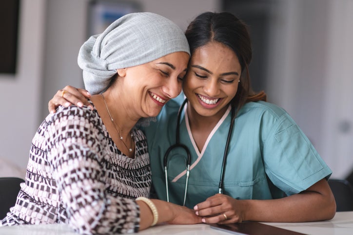 Patient smiling with doctor