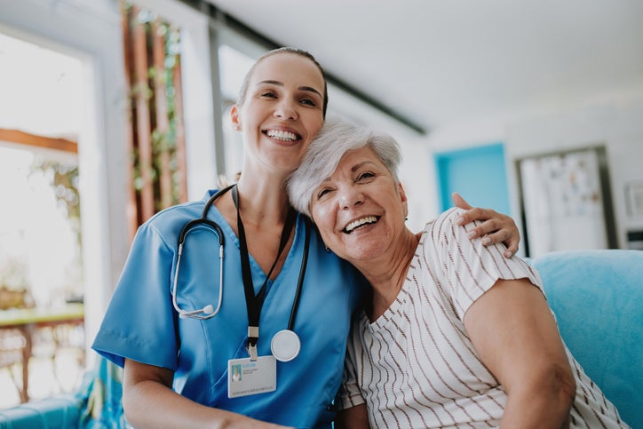 Nurse Hugging Patient