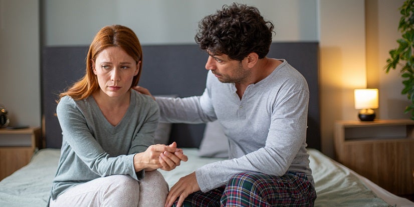 Two people talking