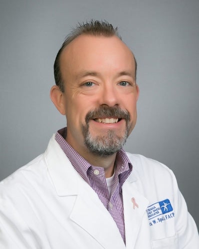 Derrick Spell, MD